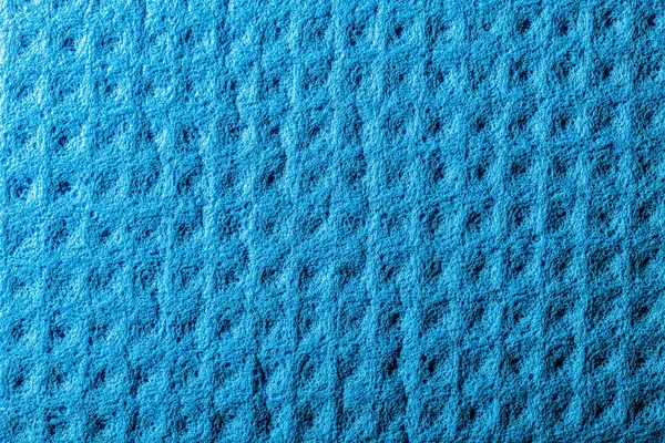 New blue kitchen dishcloth surface.