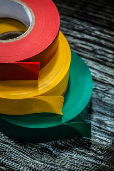 Insulation Tapes Vintage Wooden Board — Stock Photo, Image