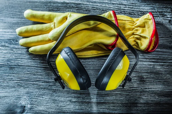 Safety Earmuffs Gloves Wooden Board — Stock Photo, Image