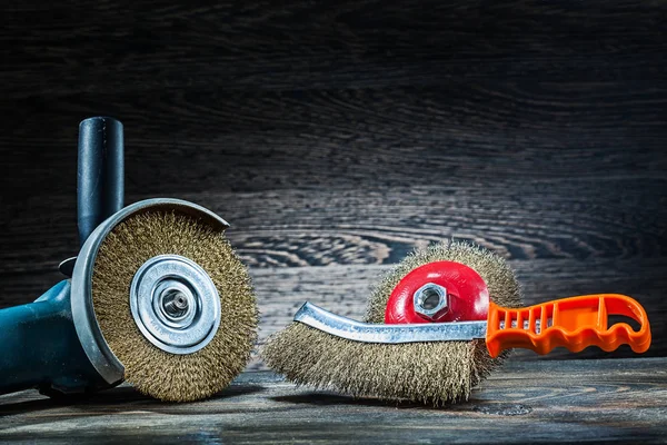 Angle grinder with abrasive wire tools on vintage wood — Stock Photo, Image