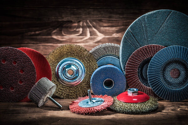 abrasive rotary wheels set on vintage wood