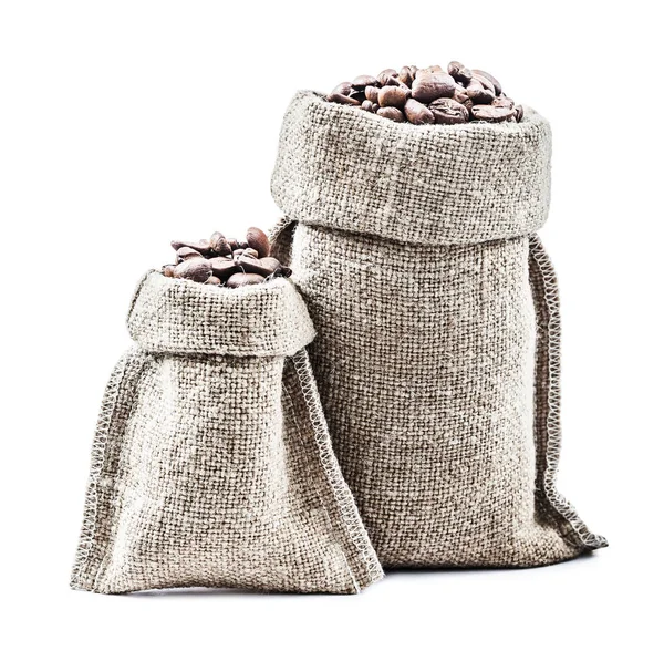 Two classic burlap sacks with coffee beans isolated white — Stock Photo, Image