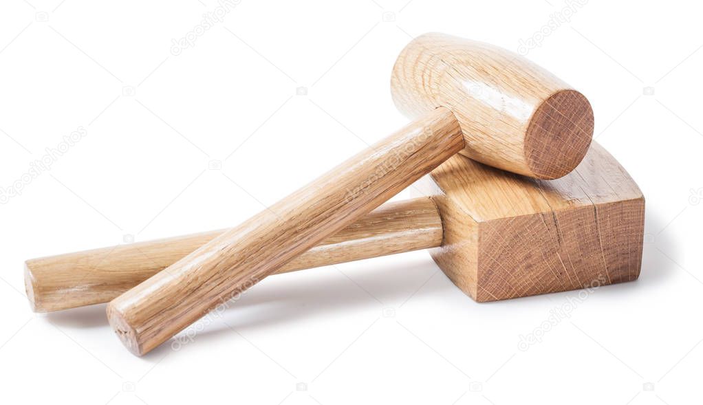 two wooden mallets woodworkers tools isolated on white bavkgroun