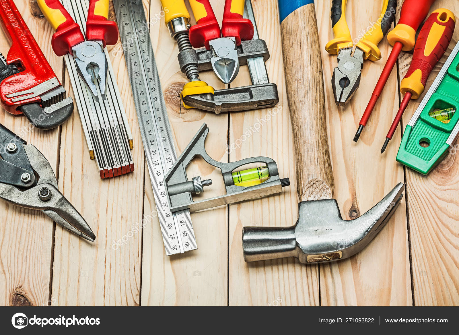 Set of construction tools on wooden boards Stock Photo by ©mihalec ...
