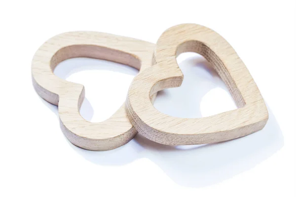 Dva dřevěné symboly hračky izolované na bílém — Stock fotografie