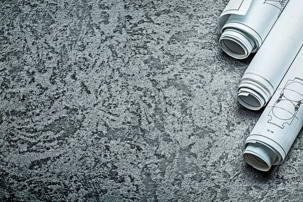 Copyspace view rolled blueprints on black background — Stock Image Copyspace view rolled blueprints on black background Royalty Free Stock Images