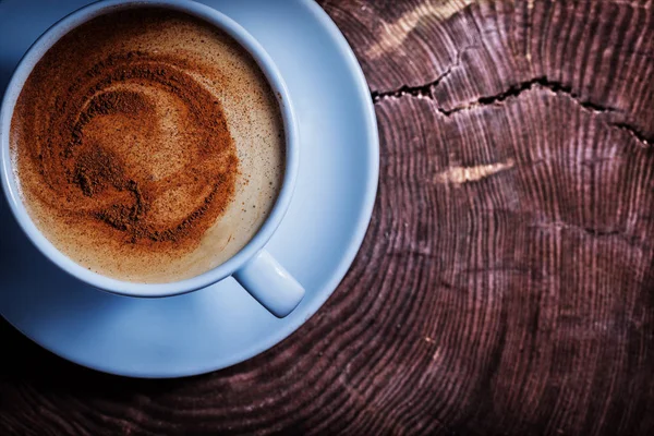 Close up view from above coffee with foam and cinnamon in white — Stock Photo, Image