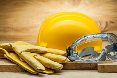deri çalışma eldiven Sarı kask ve şeffaf mavi gözlüğü