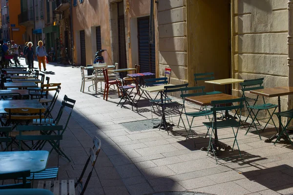 Empty street restaurant on the old town street of Perpignan, France