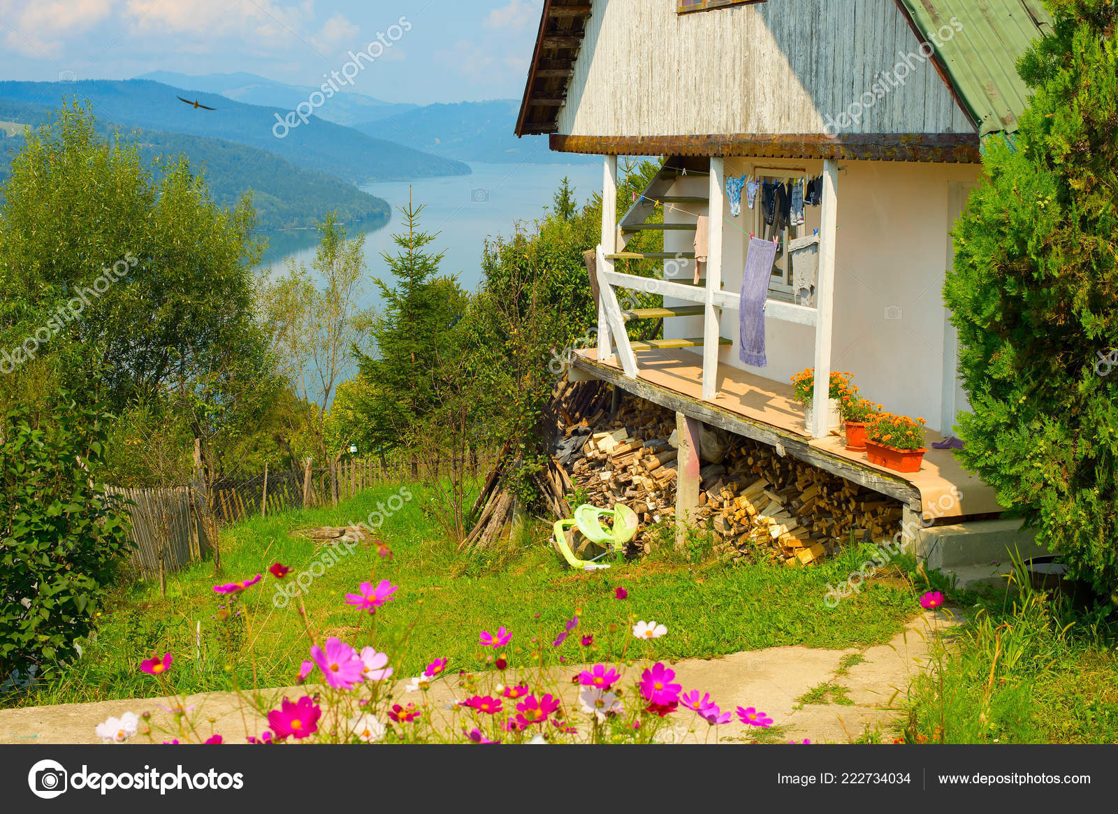 scene-typical-romanian-house-green-flowering-garden-muntelui-mountain