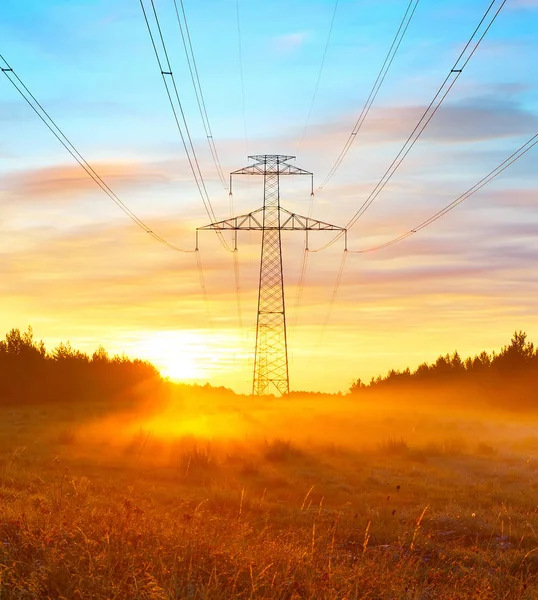 Power lines and sunrise landscape — Stock Photo, Image