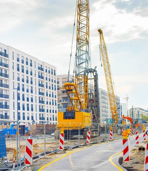 Excavator cranes construction site road — Stock Photo, Image