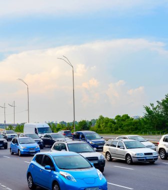 Cars in traffic jam, rush hour, city highway, Kyiv, Ukraine clipart