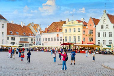 TALLINN, ESTONIA - JULY 14, 2019:  Tourists at famous Town Hall Square in Tallinn, Estonia clipart