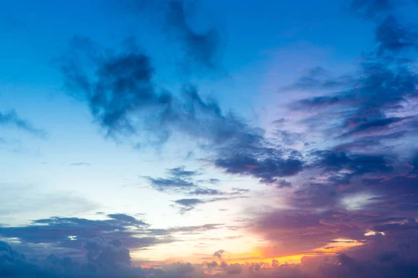 Colorful sunset sky over tranquil sea surface