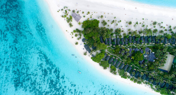 Beautiful aerial view of Maldives and tropical beach . Travel and vacation concept
