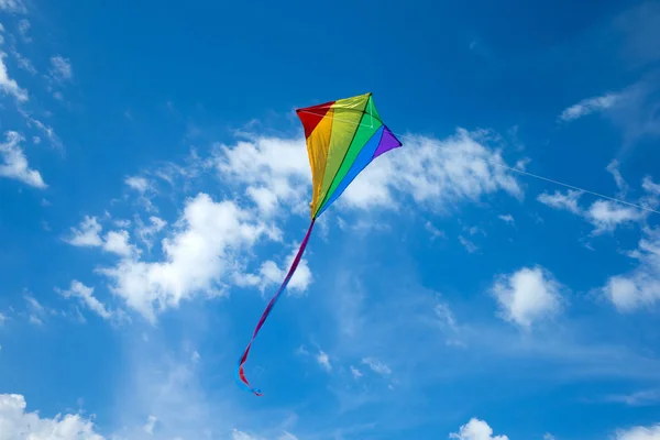 Kite flying in the sky among the clouds — Stock Photo, Image