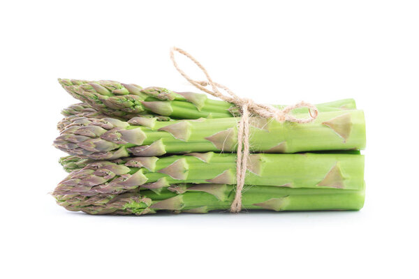 Fresh green asparagus on white