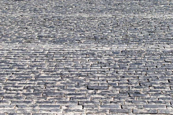 Paving stone vintage road cover. Evening road in a historical pl — Stock Photo, Image