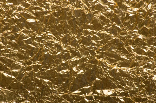 Gold brushed metal texture or background — Stock Photo, Image