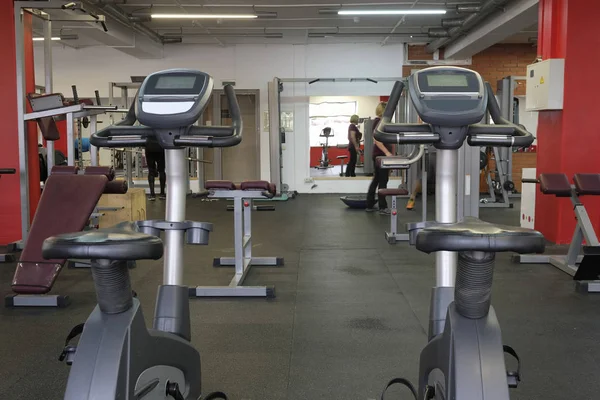 Interior of fitness hall with fitness bicycles