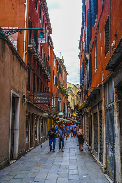 Venice, Italy - Jine, 28, 2018: pedestrian street in a center of Venice, Italy
