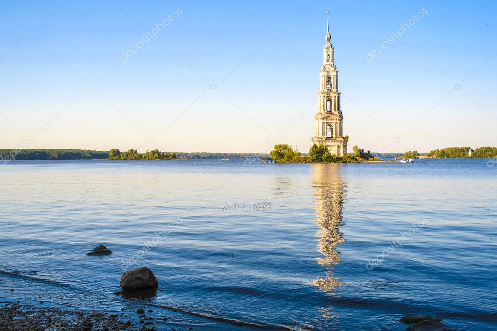 Kaliazin, Russia - August, 26, 2018: bell tower of the St. Nicholas Cathedral in Kalyazin. During the construction of the dam, part of the city was flooded. Therefore, the bell tower was on the island