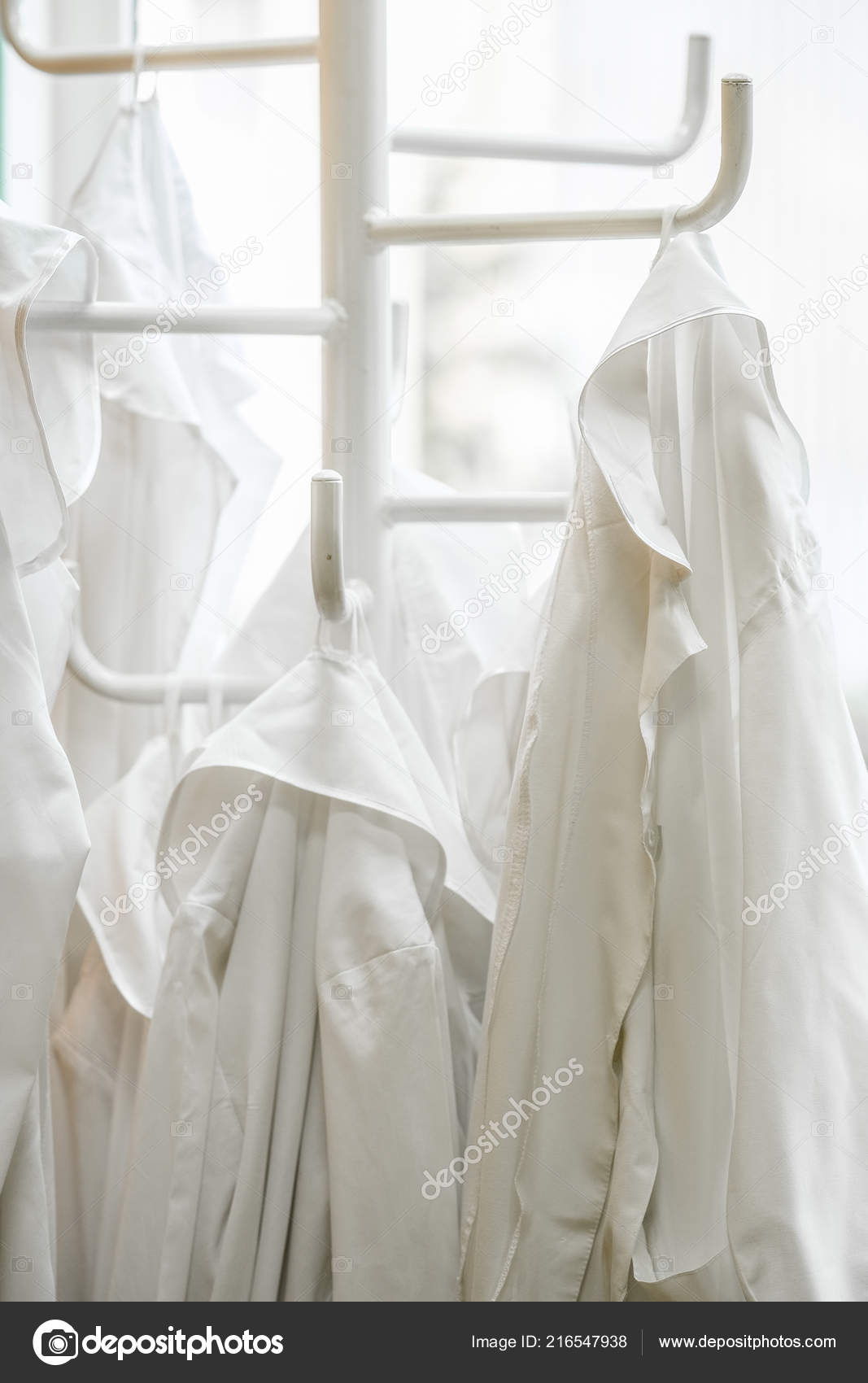 White Lab Dressings Gown Hanger Stock Photo by ©uatp12 216547938