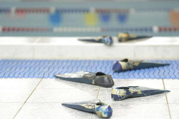 Moscow, Russia - September, 24, 2018: comic track from flippers go to the water in a swimming pool in Privet school in Moscow