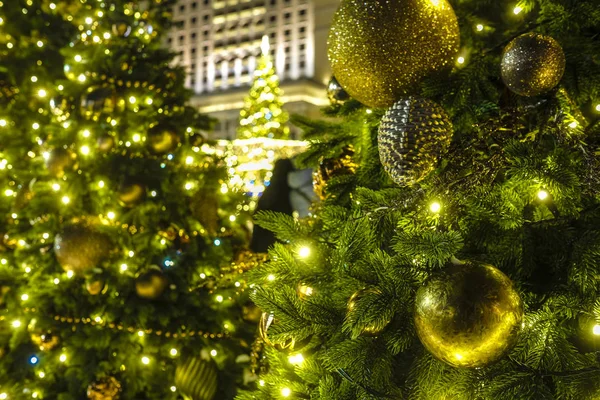 the image of the decorated Christmas tree on streets of Moscow