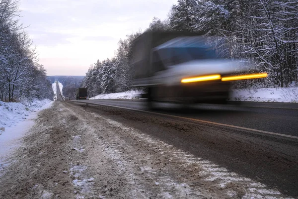image of a truck on a winter road