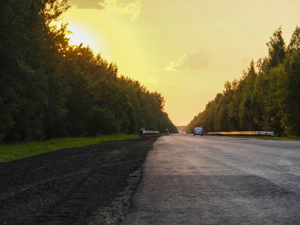 Landscape with the Image of a Country Road at sunset