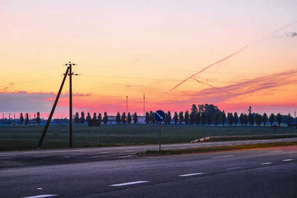 Landscape with the Image of a Country Road at sunset