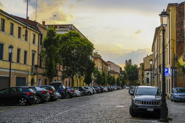 Rovigo, Italy - July, 7, 2019: cars parked on the street in Rovigo, Italy