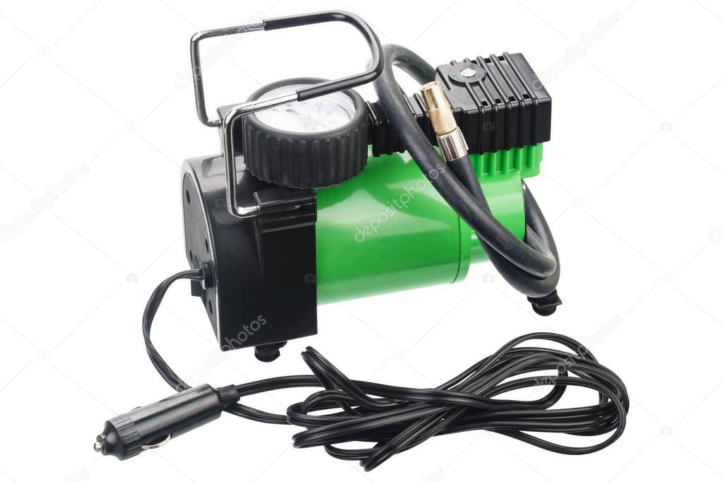 Car pump with manometer, air compressor on white