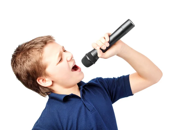 Teenage boy singing into a microphone. Very emotional. — Stock Photo, Image
