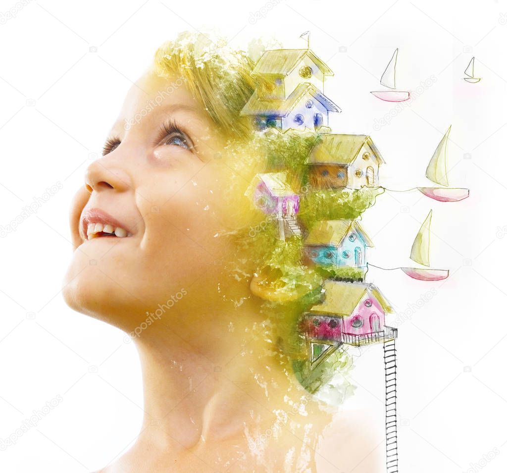 Double exposure portrait of a young smiling child combined with 