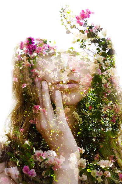 Double exposure of an elegant natural beauty with hand on face a — Stock Photo, Image