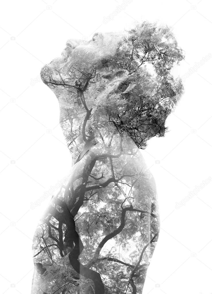 Double exposure of a young bare-chested man���s portrait blended