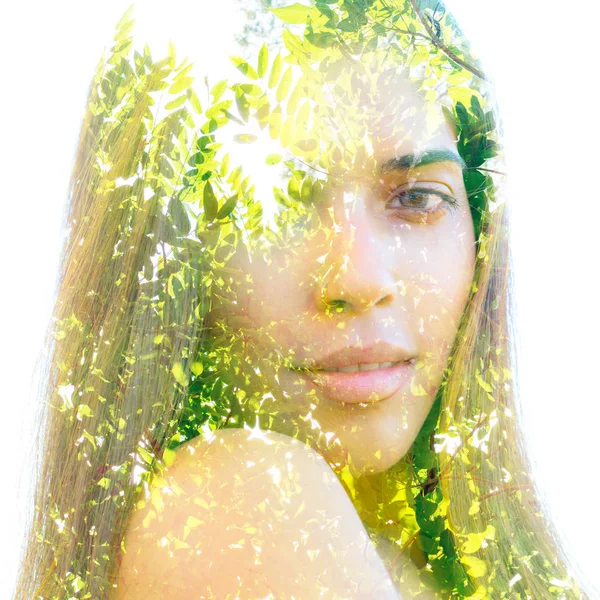 Double exposure portrait of a young natural beauty combined with — Stock Photo, Image