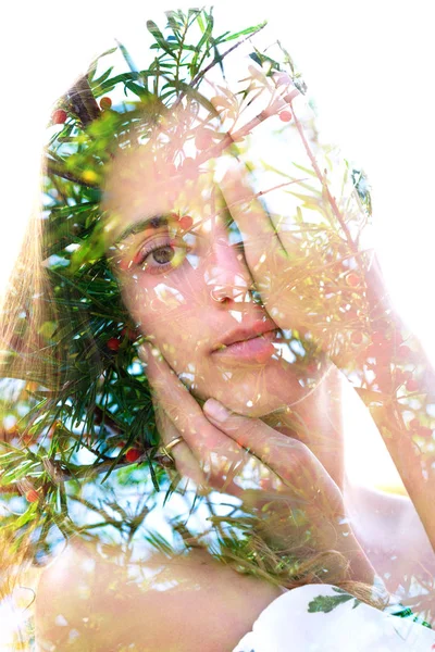 Double exposure of a natural beauty with hand covering half her — Stock Photo, Image
