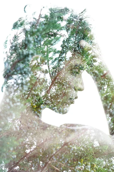 Double exposure of a young man���s profile portrait blended with — Stock Photo, Image