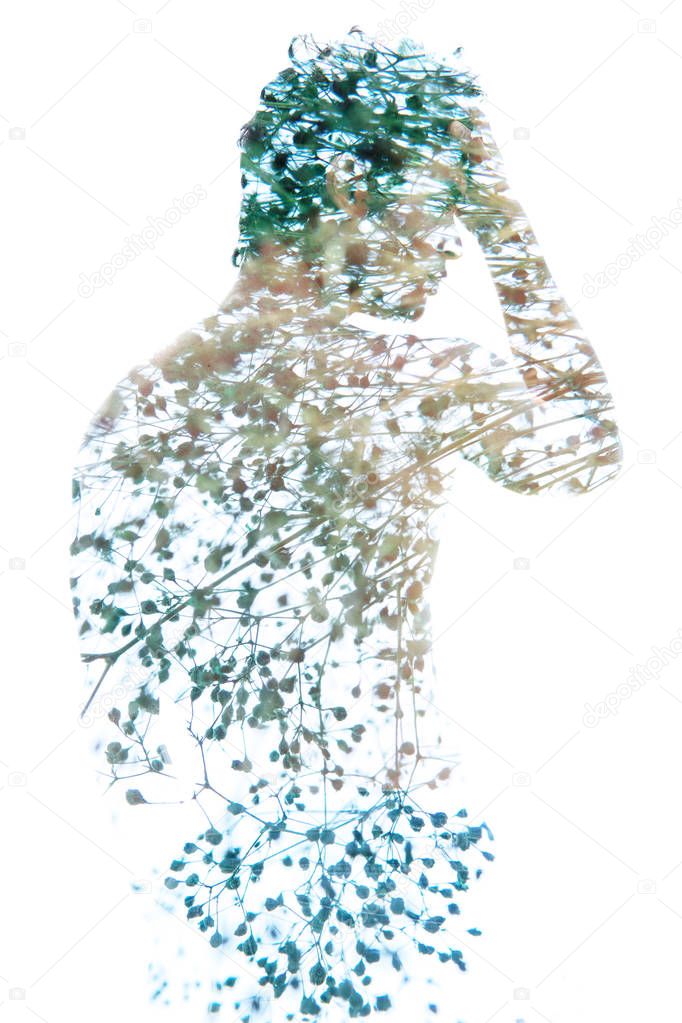 Double exposure, of a young shirtless man blended with bright tr