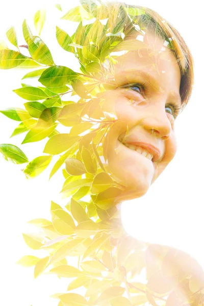 Double exposure portrait of a young child combined with lush, br — Stock Photo, Image