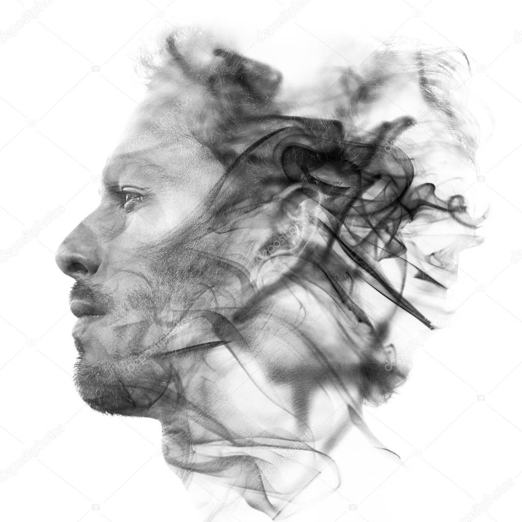 Double exposure portrait of a sexy statuesque man with dark feat