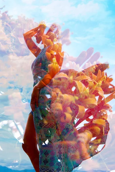 Double exposure photograph of a natural beauty wearing a flowing — Stock Photo, Image