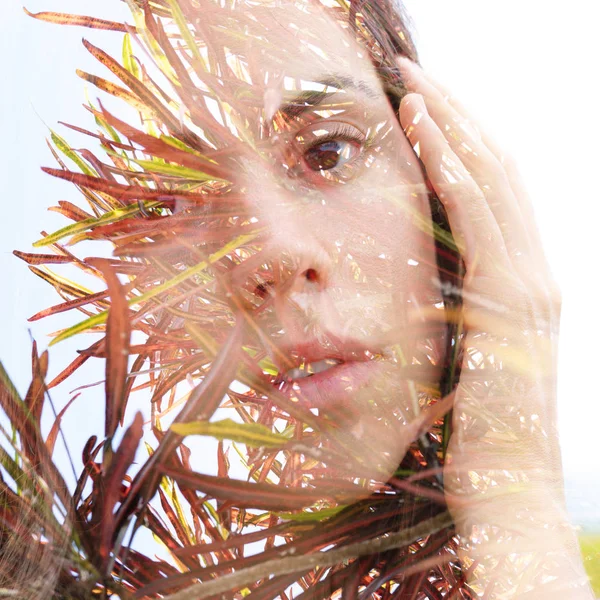 Double exposure portrait of a young natural beauty combined with — Stock Photo, Image