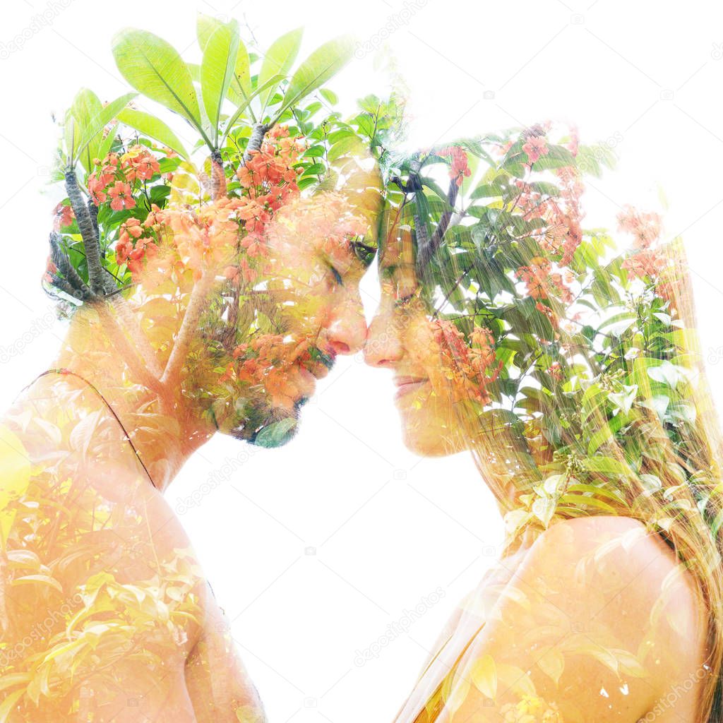 Double exposure of a beautiful young couple combined with bright