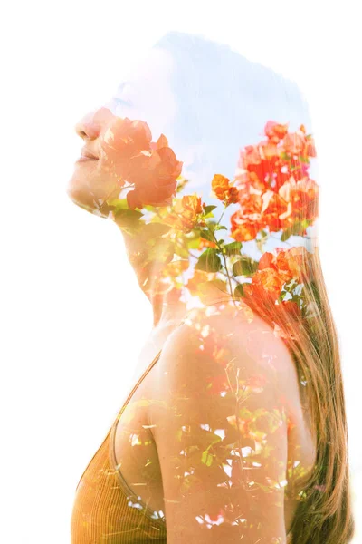 Double exposure profile of a natural beauty with lush orange flo — Stock Photo, Image