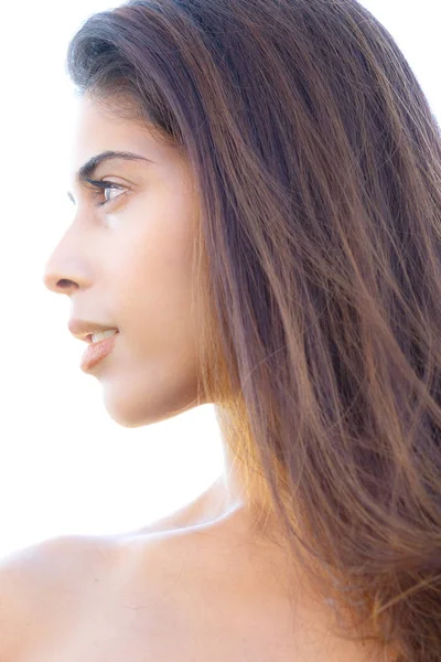 Close up profile portrait of an attractive, woman with long hair — Stock Photo, Image